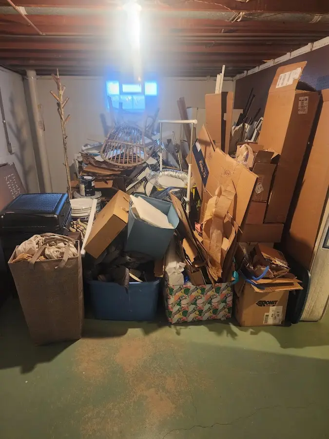 Roll-off dumpster container at job site for Yard Waste Dumpster Rental in New Brunswick